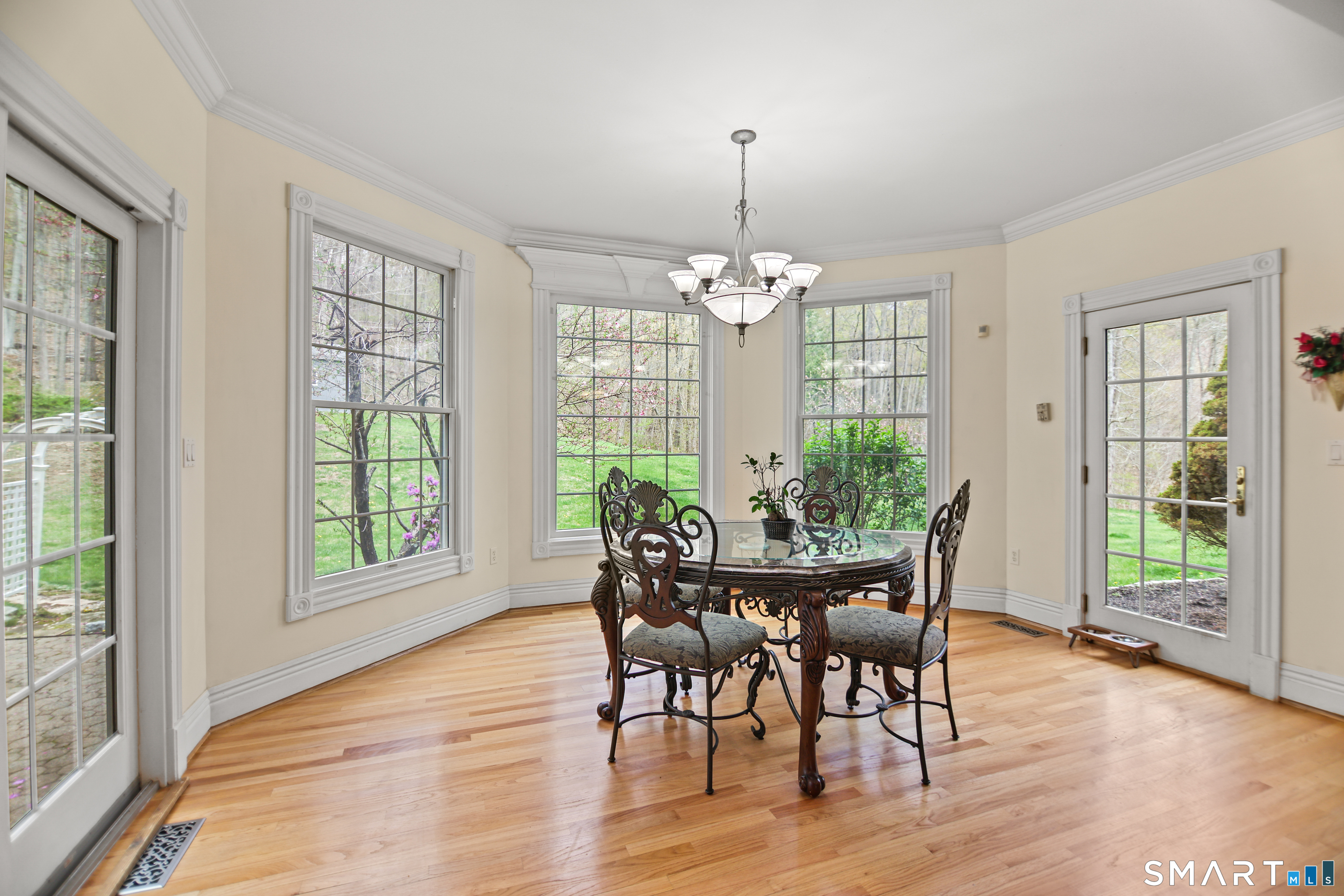 83 Bayberry Hill Road Avon, CT 06001 - Photo 17 of 34 a view of a dining room with furniture window and wooden floor