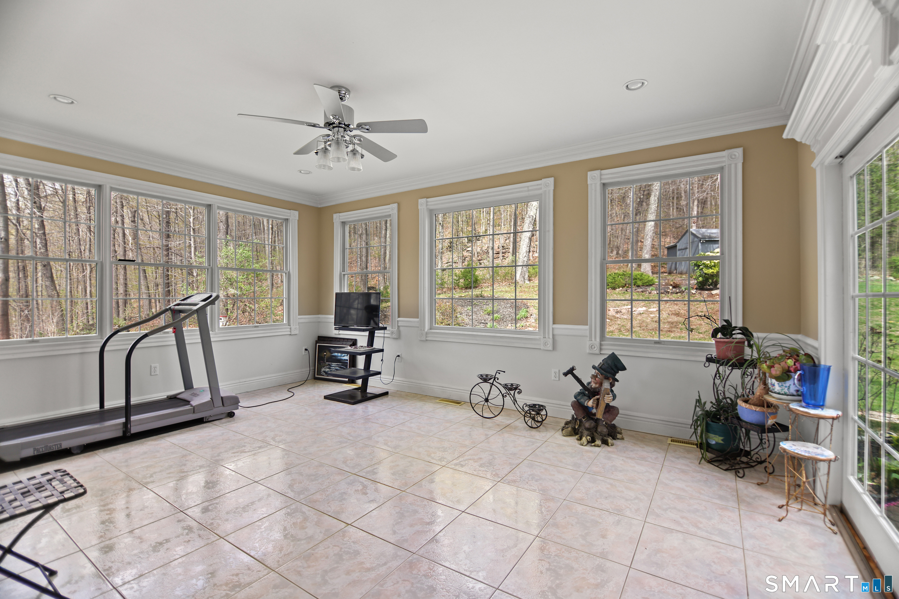 83 Bayberry Hill Road Avon, CT 06001 - Photo 19 of 34 a living room with furniture and a large window