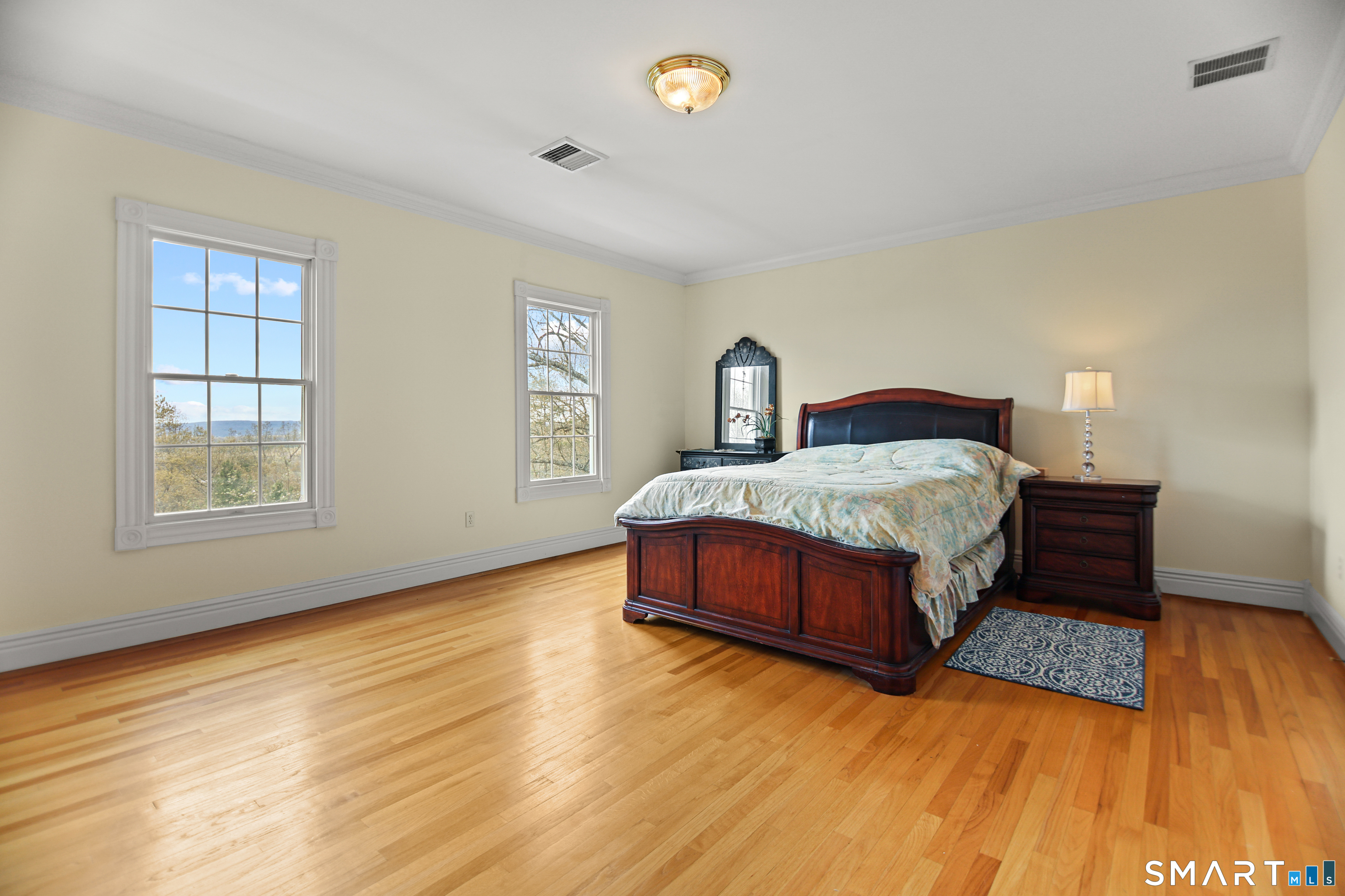 83 Bayberry Hill Road Avon, CT 06001 - Photo 23 of 34 a bedroom with a bed and window