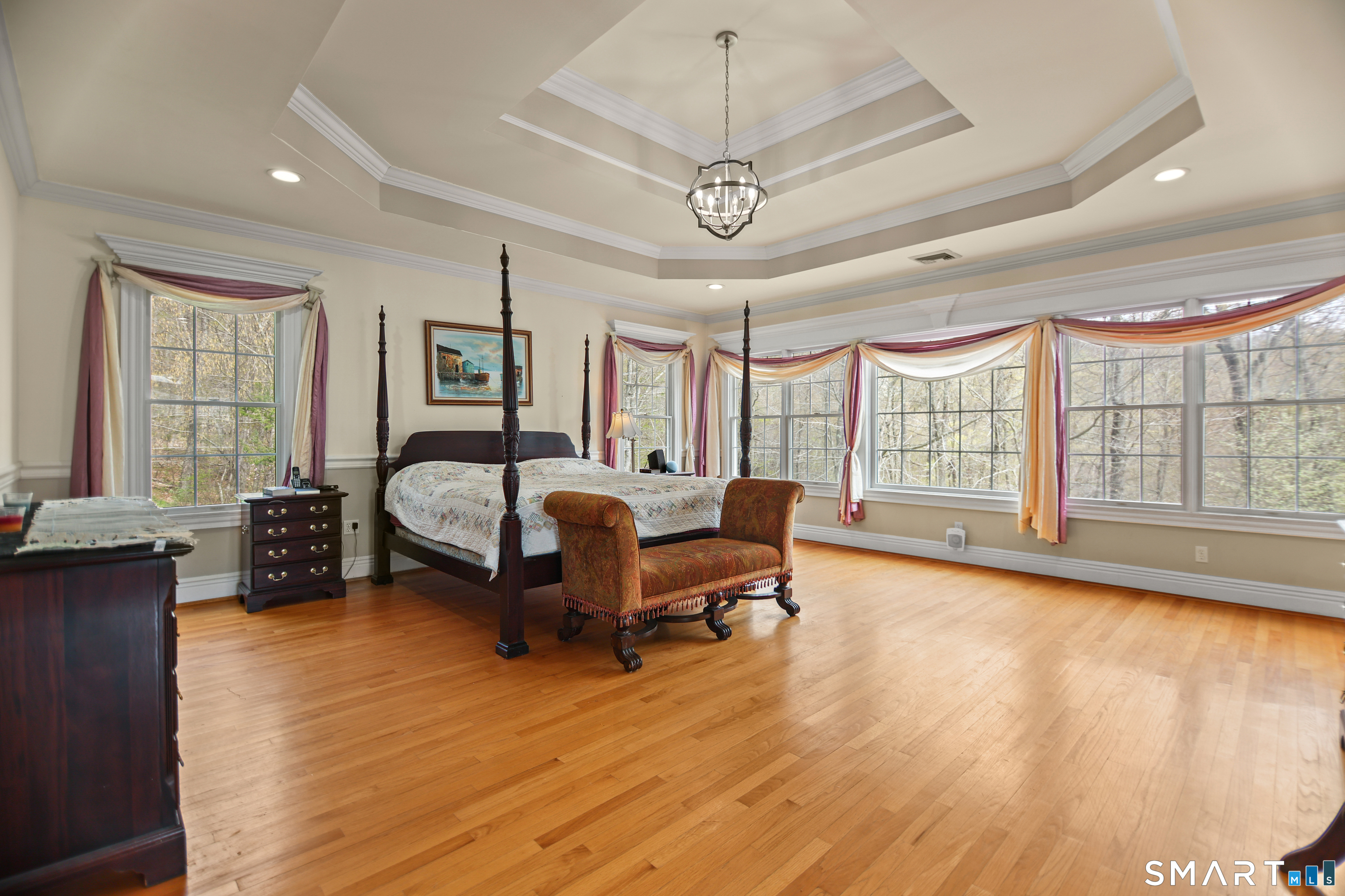 83 Bayberry Hill Road Avon, CT 06001 - Photo 25 of 34 a bedroom with furniture and a large window