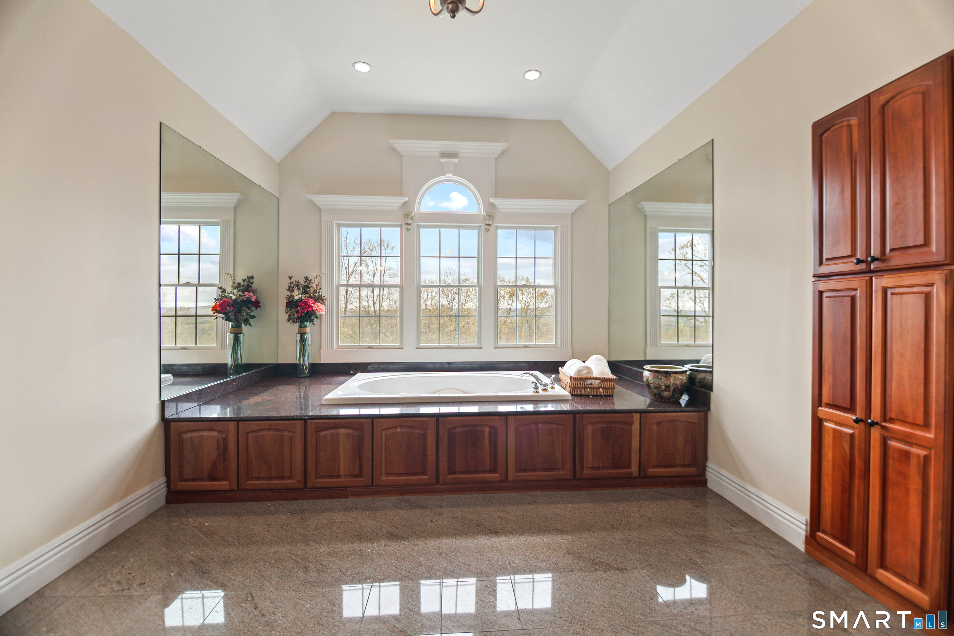 83 Bayberry Hill Road Avon, CT 06001 - Photo 26 of 34 a kitchen with stainless steel appliances granite countertop a sink and a refrigerator