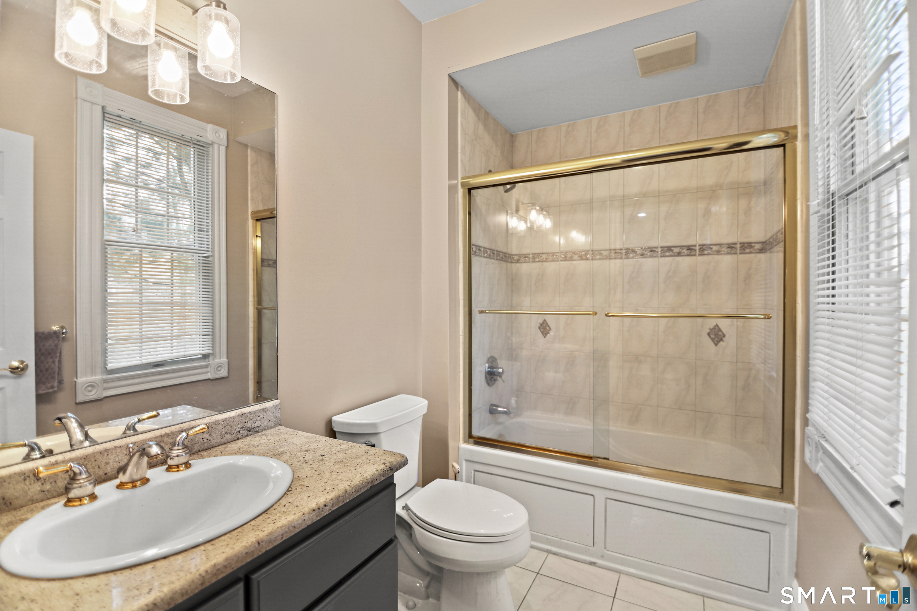 83 Bayberry Hill Road Avon, CT 06001 - Photo 28 of 34 a bathroom with a sink toilet and shower