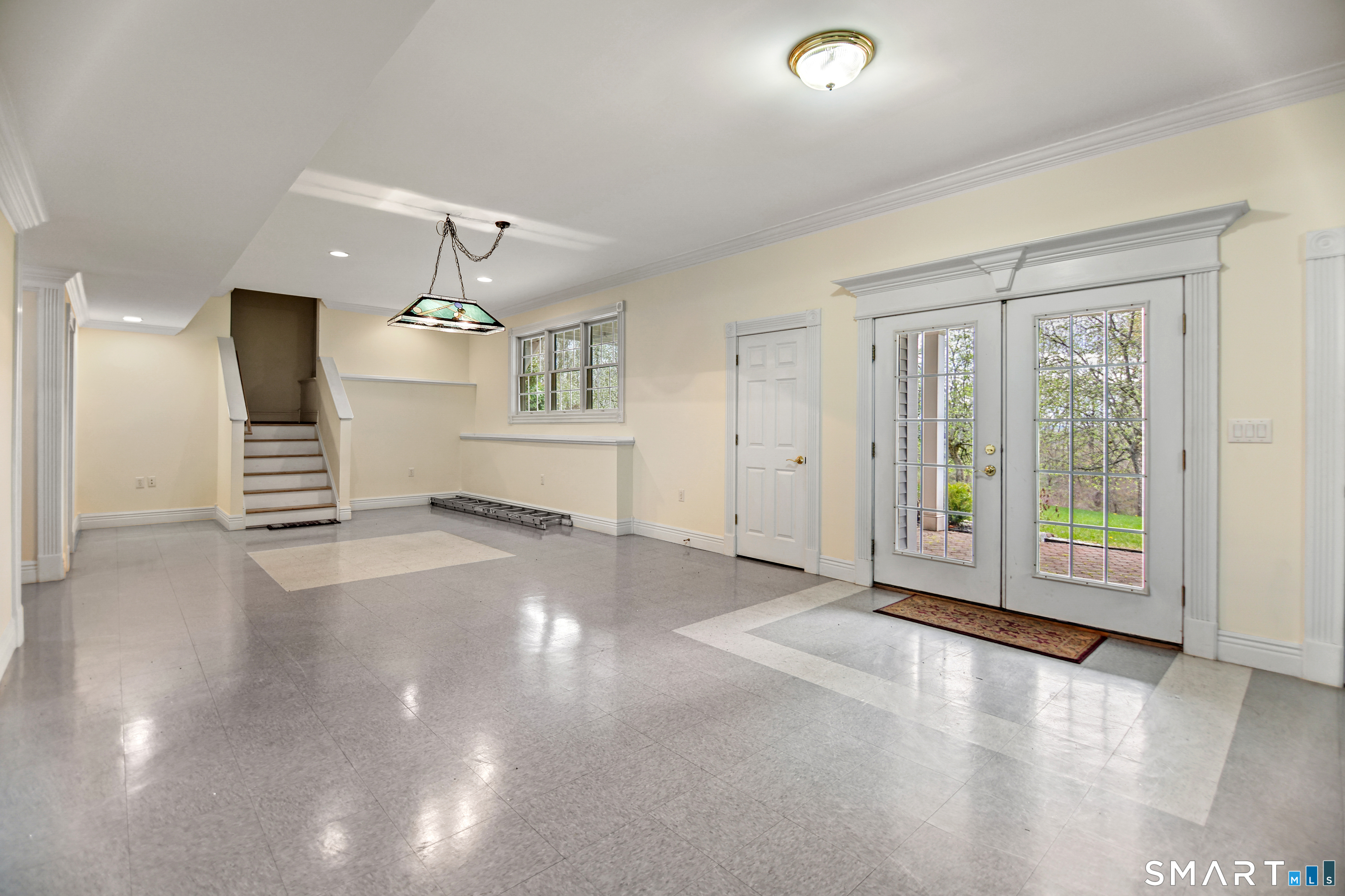 83 Bayberry Hill Road Avon, CT 06001 - Photo 31 of 34 an empty room with windows and pillars in it