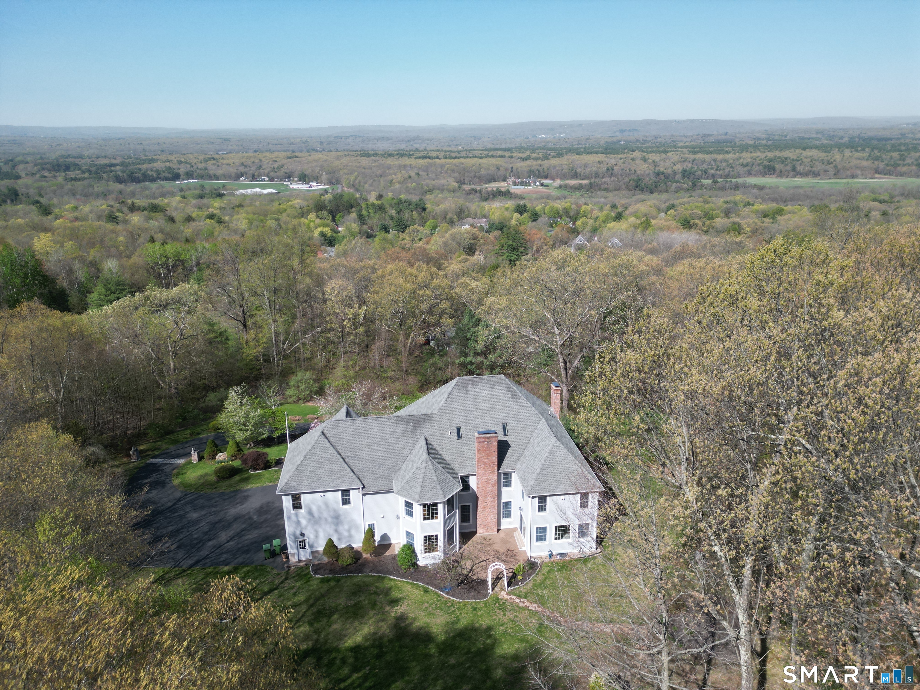 83 Bayberry Hill Road Avon, CT 06001 - Photo 4 of 34 an aerial view of a house with big yard