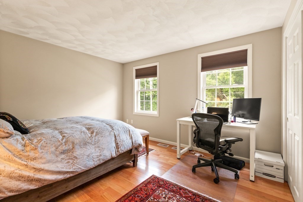 359 Concord Road Billerica, MA 01821 - Photo 31 of 35 a bedroom with a bed and a window