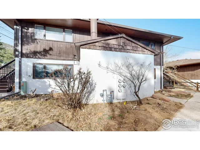a black and white photo of a house