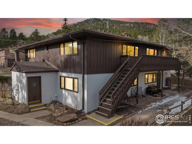 a black and white photo of a house