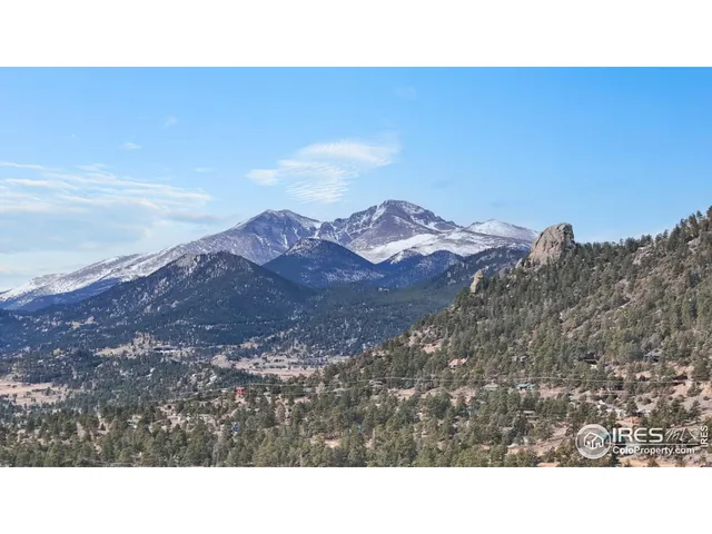 a black and white photo of a mountain