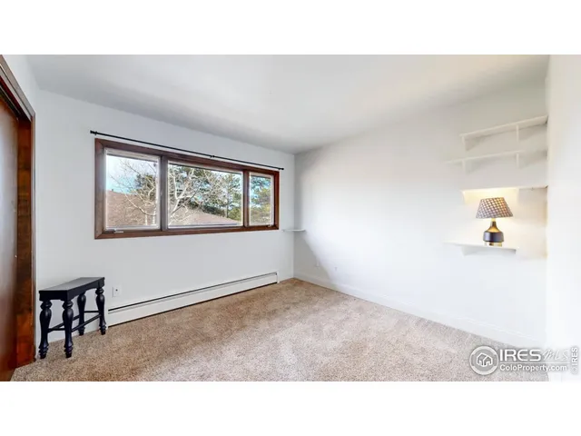 a black and white photo of a living room
