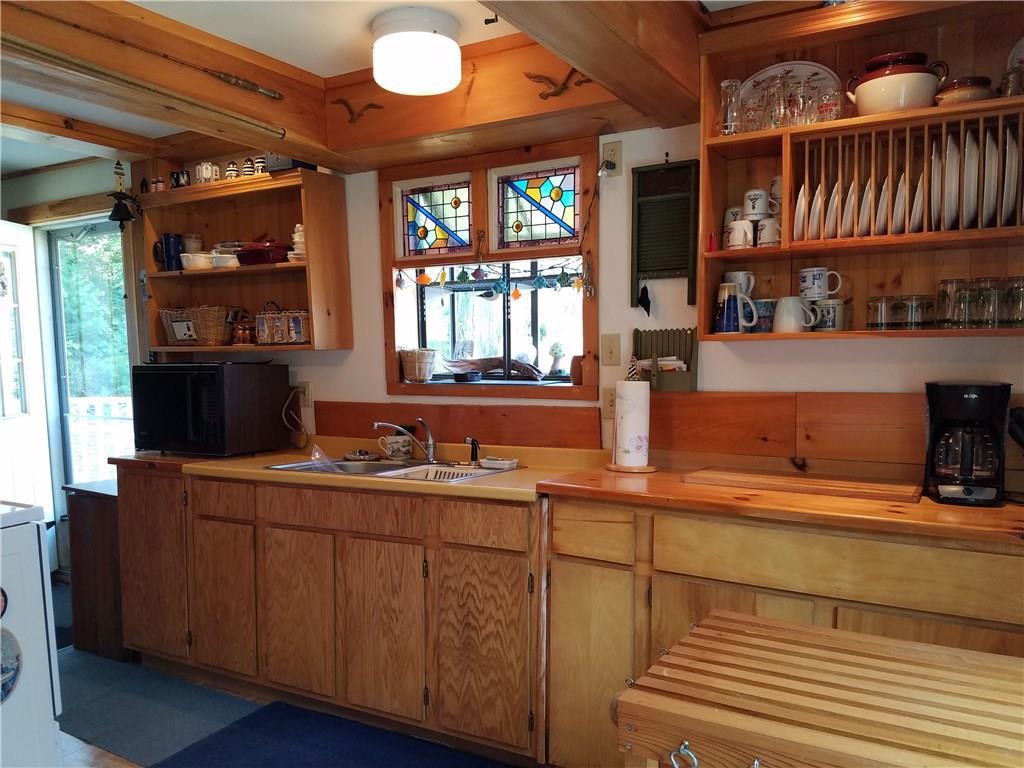 40 Middle Road Boothbay Harbor, ME 04538 - Photo 3 of 21 The kitchen with ceiling fan, pine...