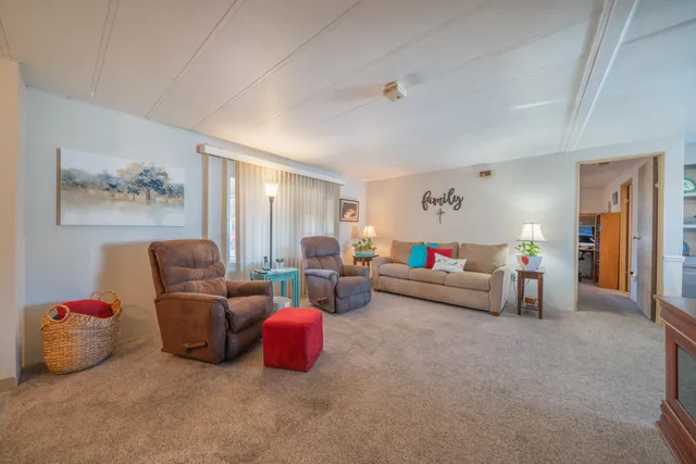 a kitchen with stainless steel appliances a stove microwave and cabinets