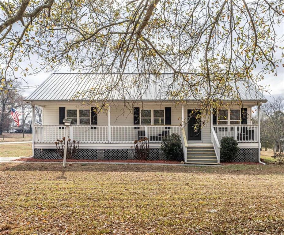 113 Baxter Road Southeast Calhoun, GA 30701 - Photo 1 of 1 front view of a house with a yard