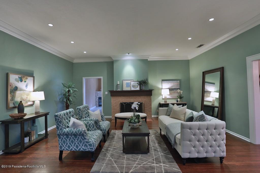 2556 Tanoble Drive Altadena, CA 91001 - Photo 3 of 44 a living room with furniture and a wooden floor
