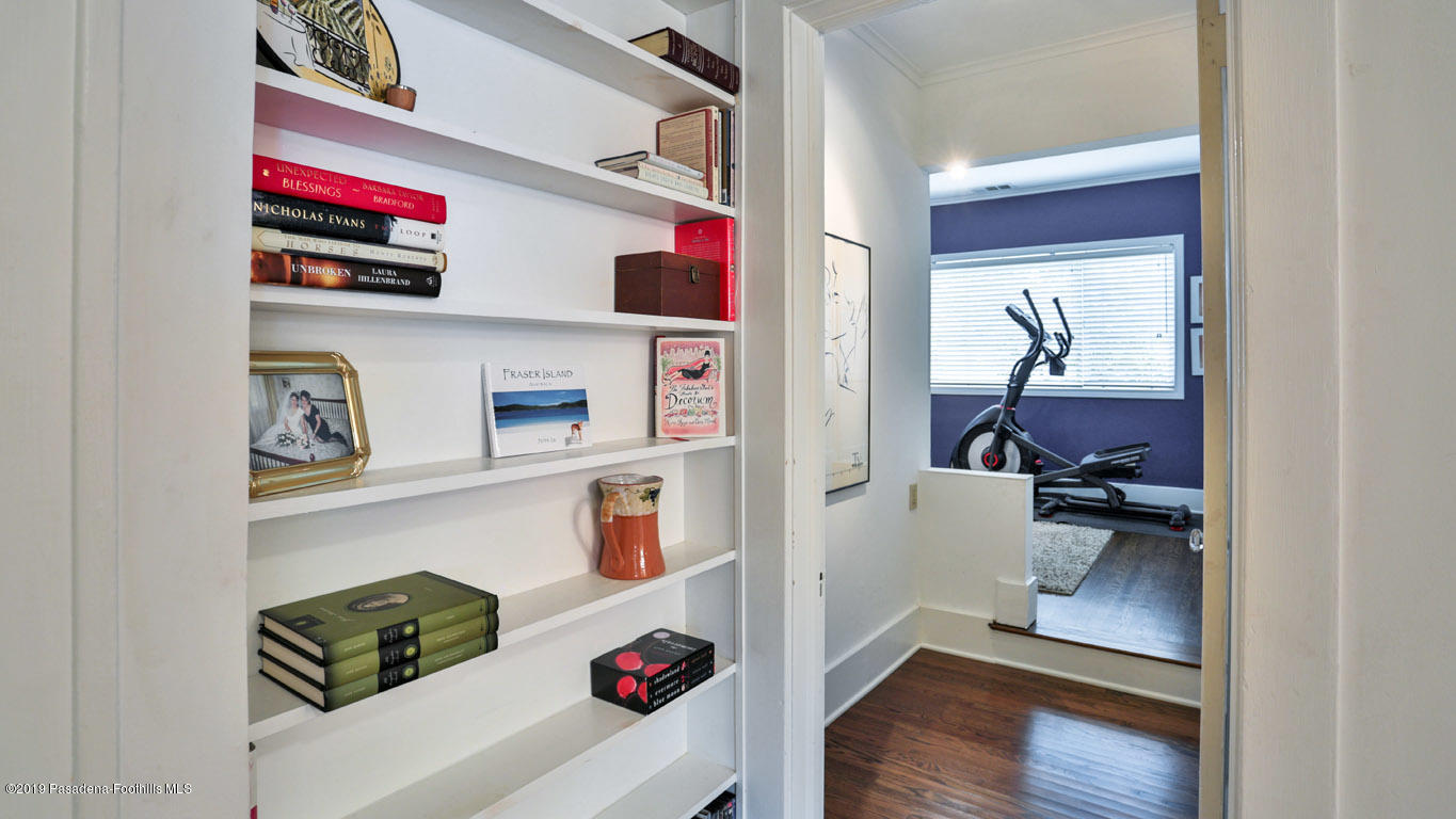 2556 Tanoble Drive Altadena, CA 91001 - Photo 23 of 44 a living room with furniture and a wooden floor