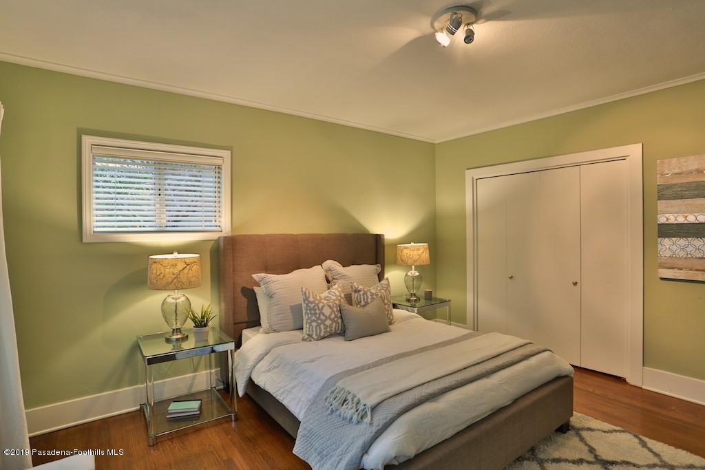 2556 Tanoble Drive Altadena, CA 91001 - Photo 29 of 44 a bedroom with a bed and a window