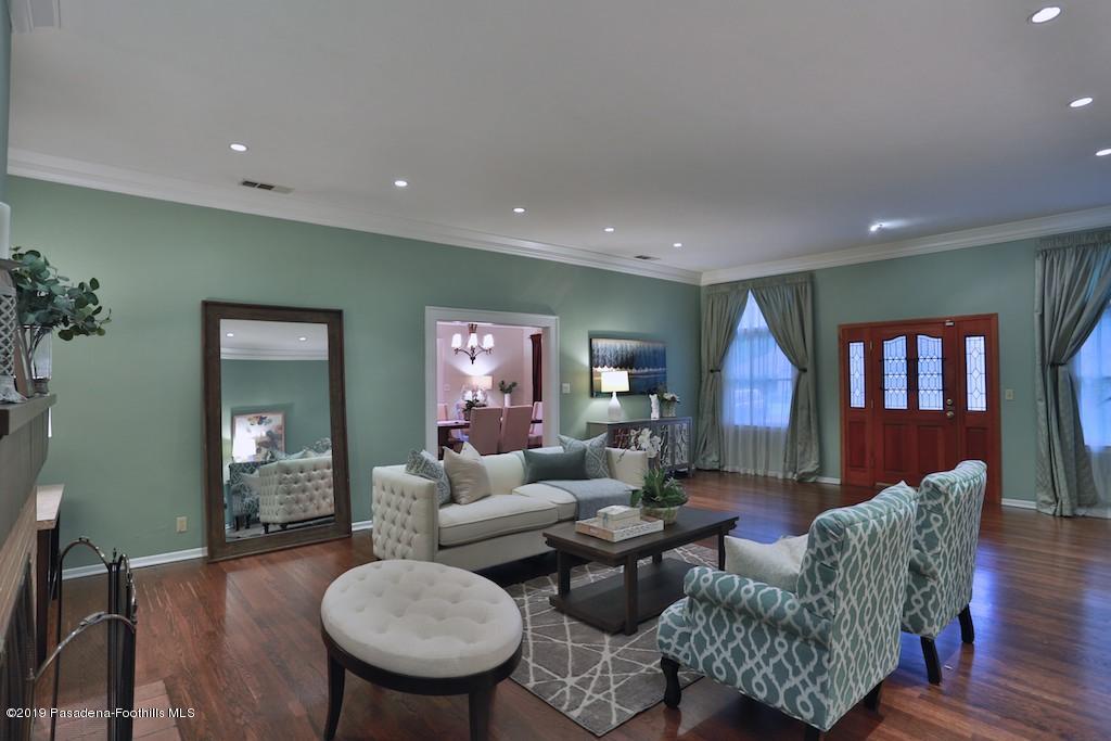 2556 Tanoble Drive Altadena, CA 91001 - Photo 4 of 44 a living room with furniture and a wooden floor