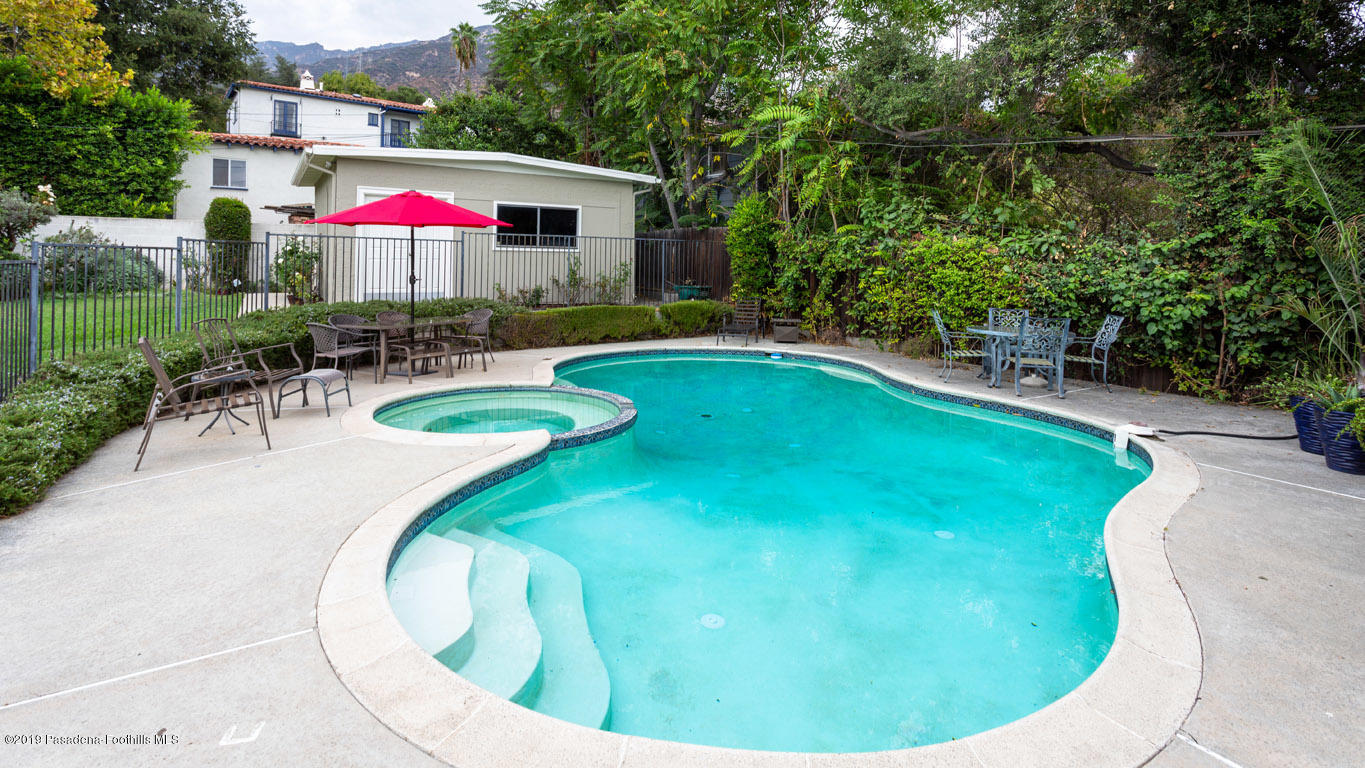 2556 Tanoble Drive Altadena, CA 91001 - Photo 36 of 44 a view of a swimming pool with a patio