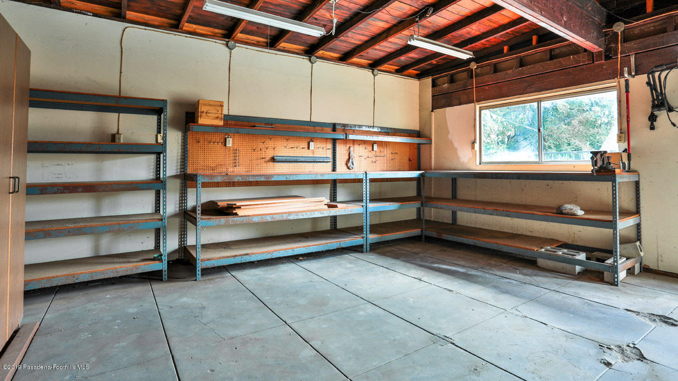 2556 Tanoble Drive Altadena, CA 91001 - Photo 42 of 44 a view of a room with racks on the wall