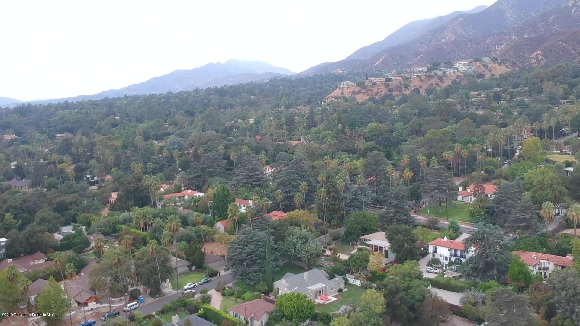 2556 Tanoble Drive Altadena, CA 91001 - Photo 44 of 44 a view of a house with a yard and a lot of flower