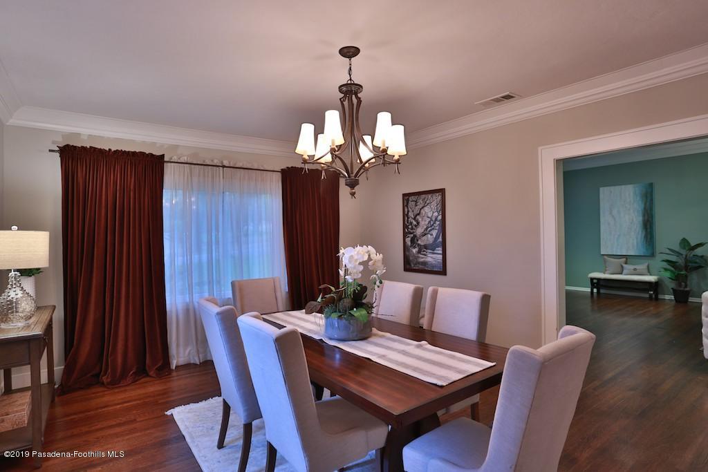 2556 Tanoble Drive Altadena, CA 91001 - Photo 6 of 44 a dining room with furniture and wooden floor
