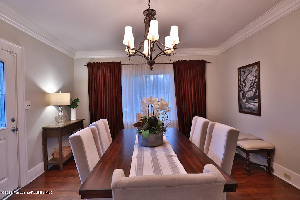 2556 Tanoble Drive Altadena, CA 91001 - Photo 7 of 44 a living room with furniture flowerpot and wooden floor