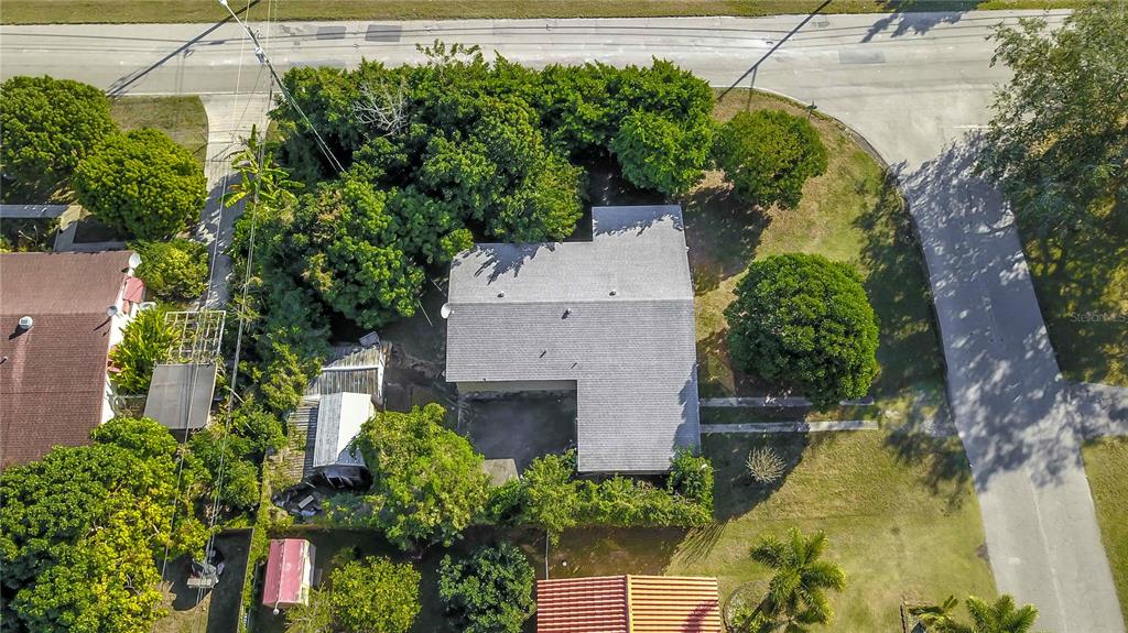 16705 Southwest 298th Terrace Homestead, FL 33030 - Photo 12 of 26 an aerial view of a house with a yard