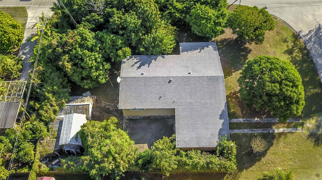 16705 Southwest 298th Terrace Homestead, FL 33030 - Photo 13 of 26 an aerial view of a house with a yard and lake view