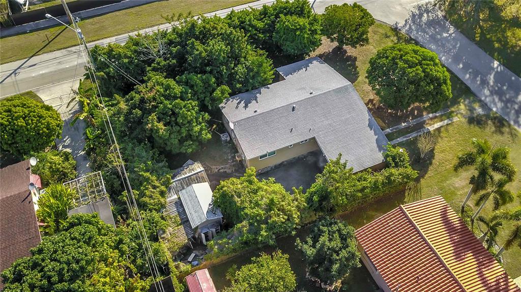 16705 Southwest 298th Terrace Homestead, FL 33030 - Photo 14 of 26 an aerial view of a house with garden space and street view