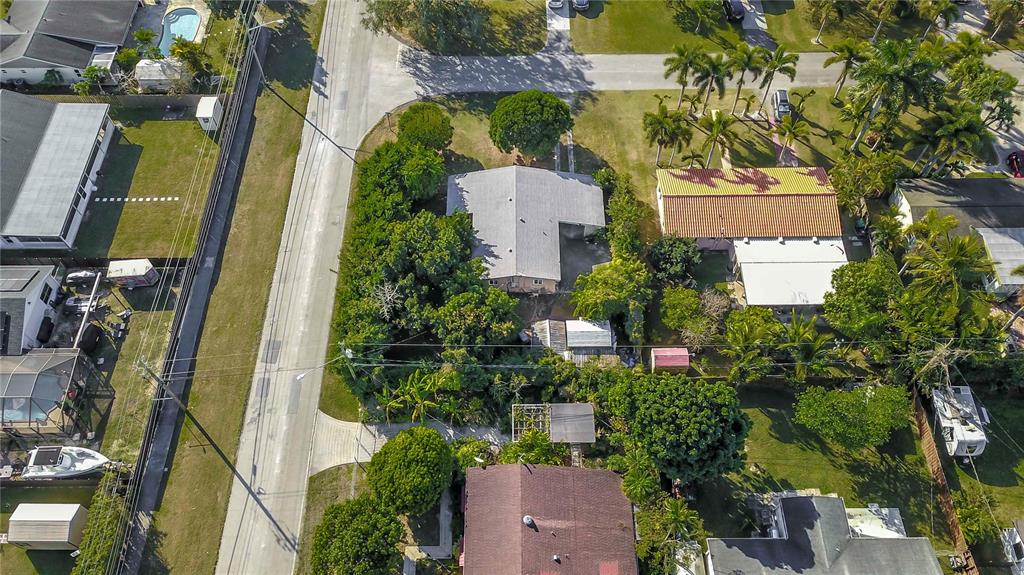16705 Southwest 298th Terrace Homestead, FL 33030 - Photo 18 of 26 an aerial view of a house with a yard and garden