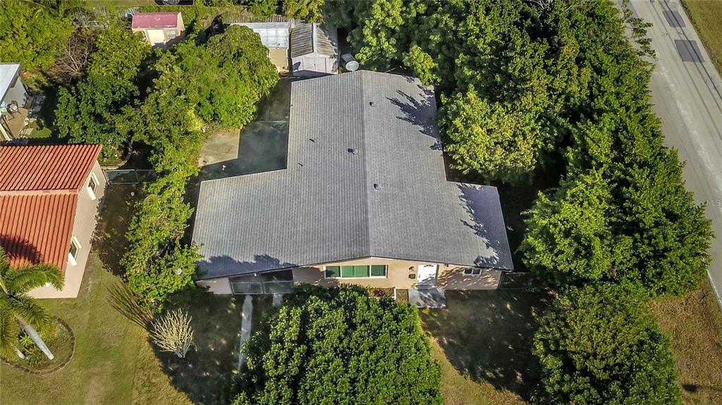 16705 Southwest 298th Terrace Homestead, FL 33030 - Photo 20 of 26 an aerial view of a house with a yard