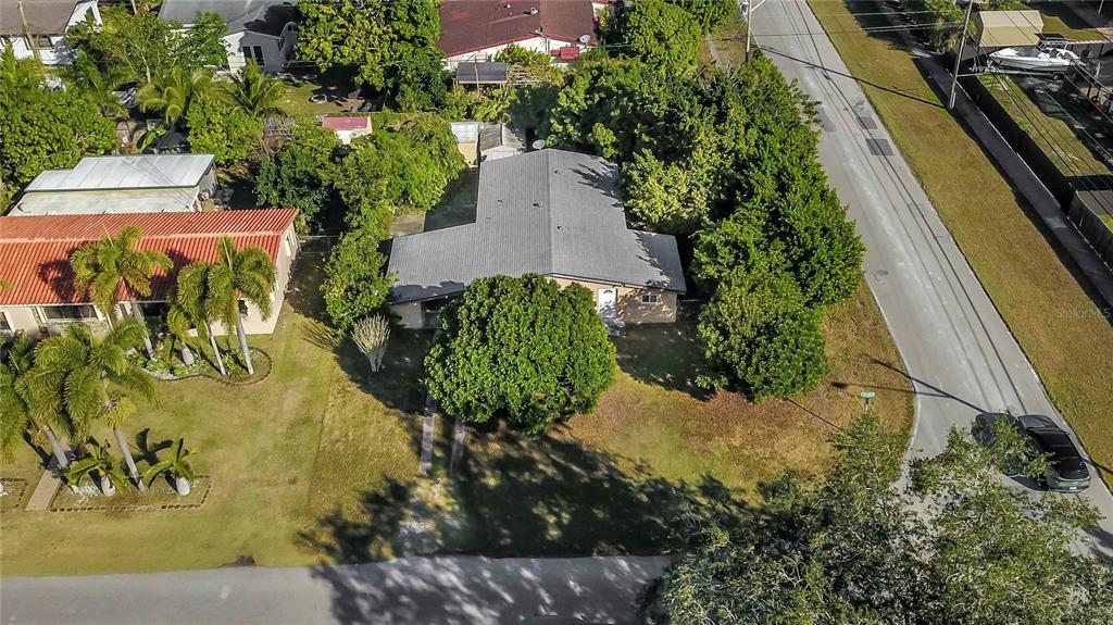 16705 Southwest 298th Terrace Homestead, FL 33030 - Photo 4 of 26 an aerial view of a house with a yard