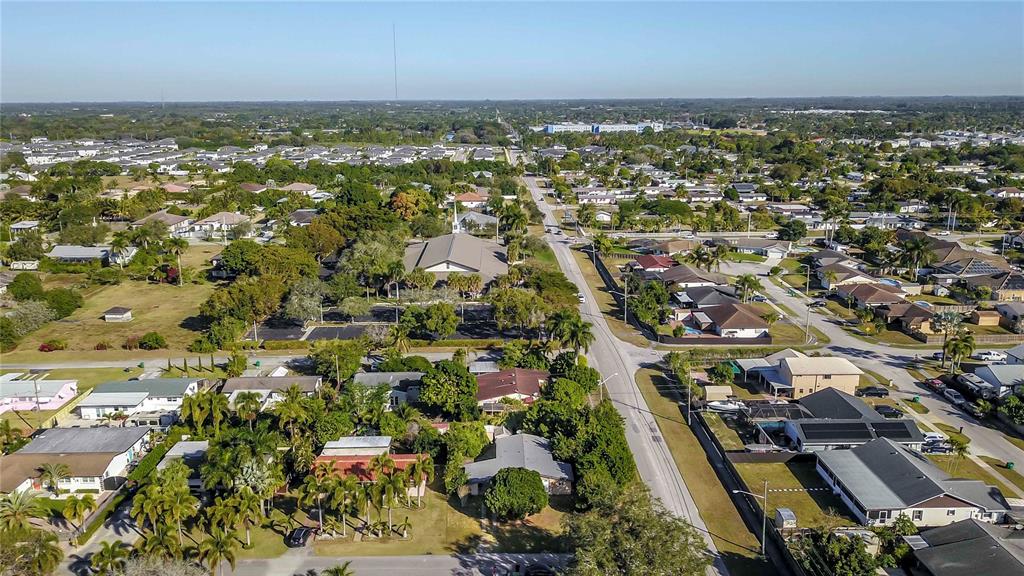 16705 Southwest 298th Terrace Homestead, FL 33030 - Photo 5 of 26 an aerial view of residential building and lake