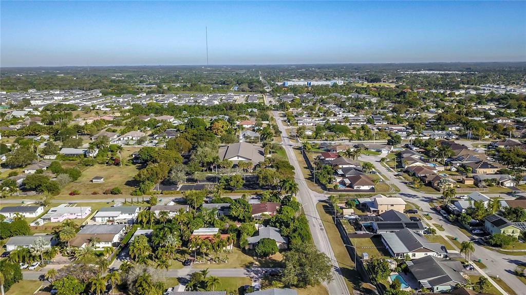 16705 Southwest 298th Terrace Homestead, FL 33030 - Photo 7 of 26 an aerial view of residential building with parking space