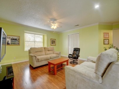6601 Ripple Run Austin, TX 78744 - Photo 2 of 22 a living room with furniture and a window