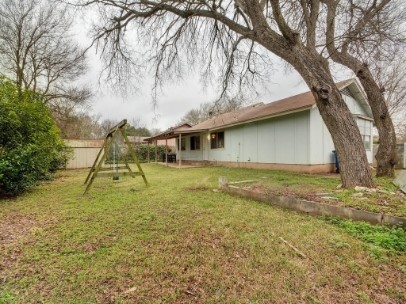 6601 Ripple Run Austin, TX 78744 - Photo 21 of 22 a house that has a tree in front of it