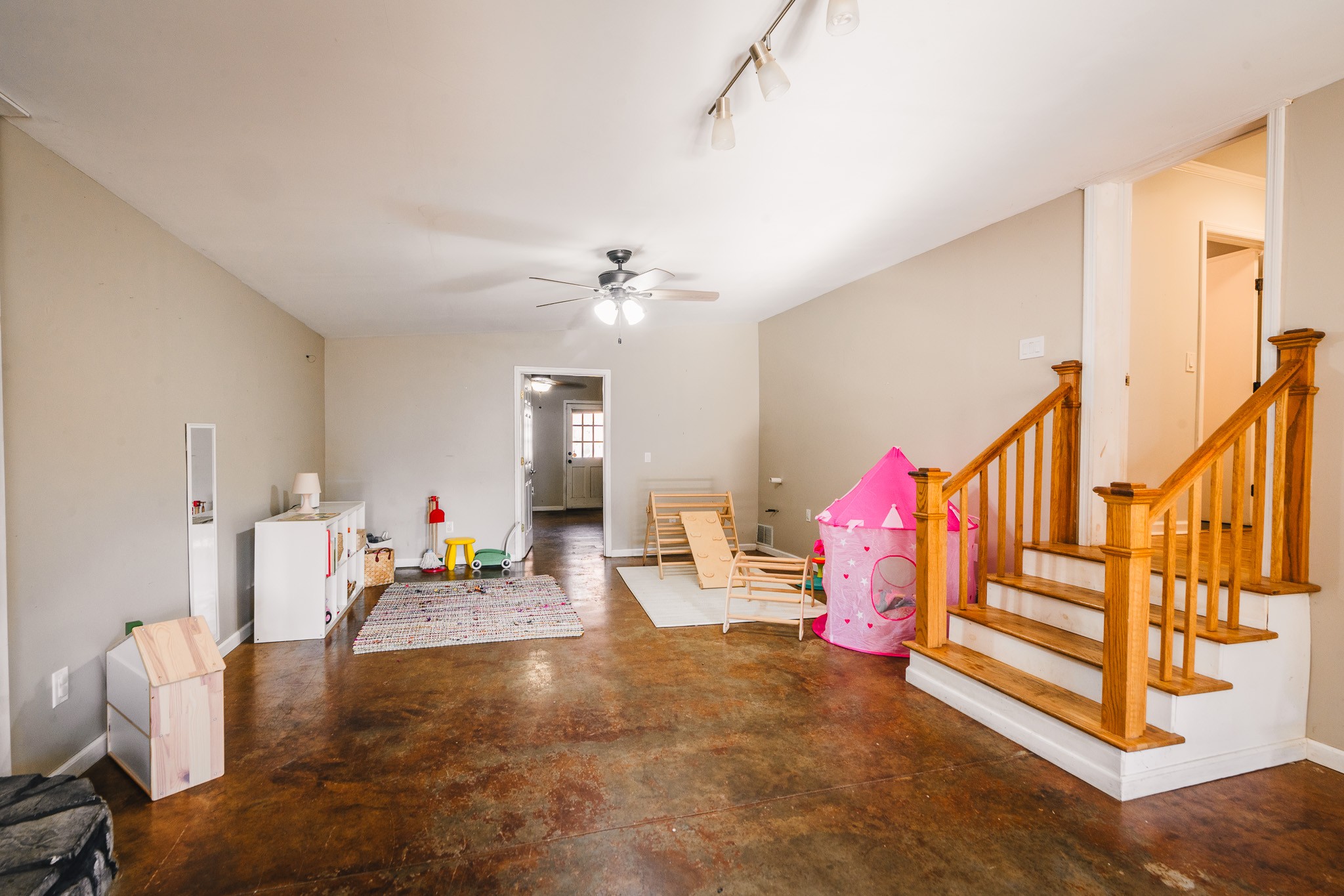 3953 Dry Fork Road Whites Creek, TN 37189 - Photo 32 of 68 a living room with lots of furniture and a chandelier
