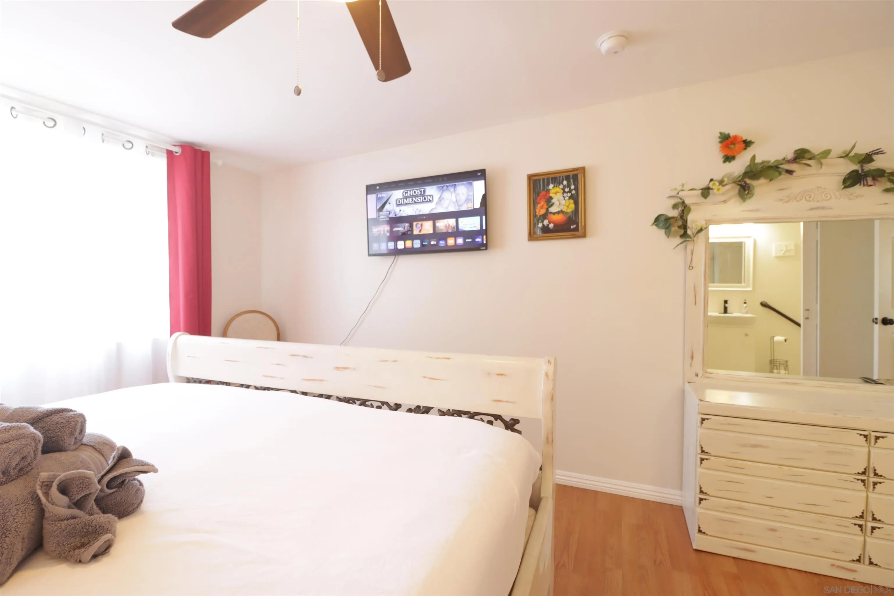 1233 Cresthill Road El Cajon, CA 92021 - Photo 16 of 50 a bedroom with a bed and a dresser