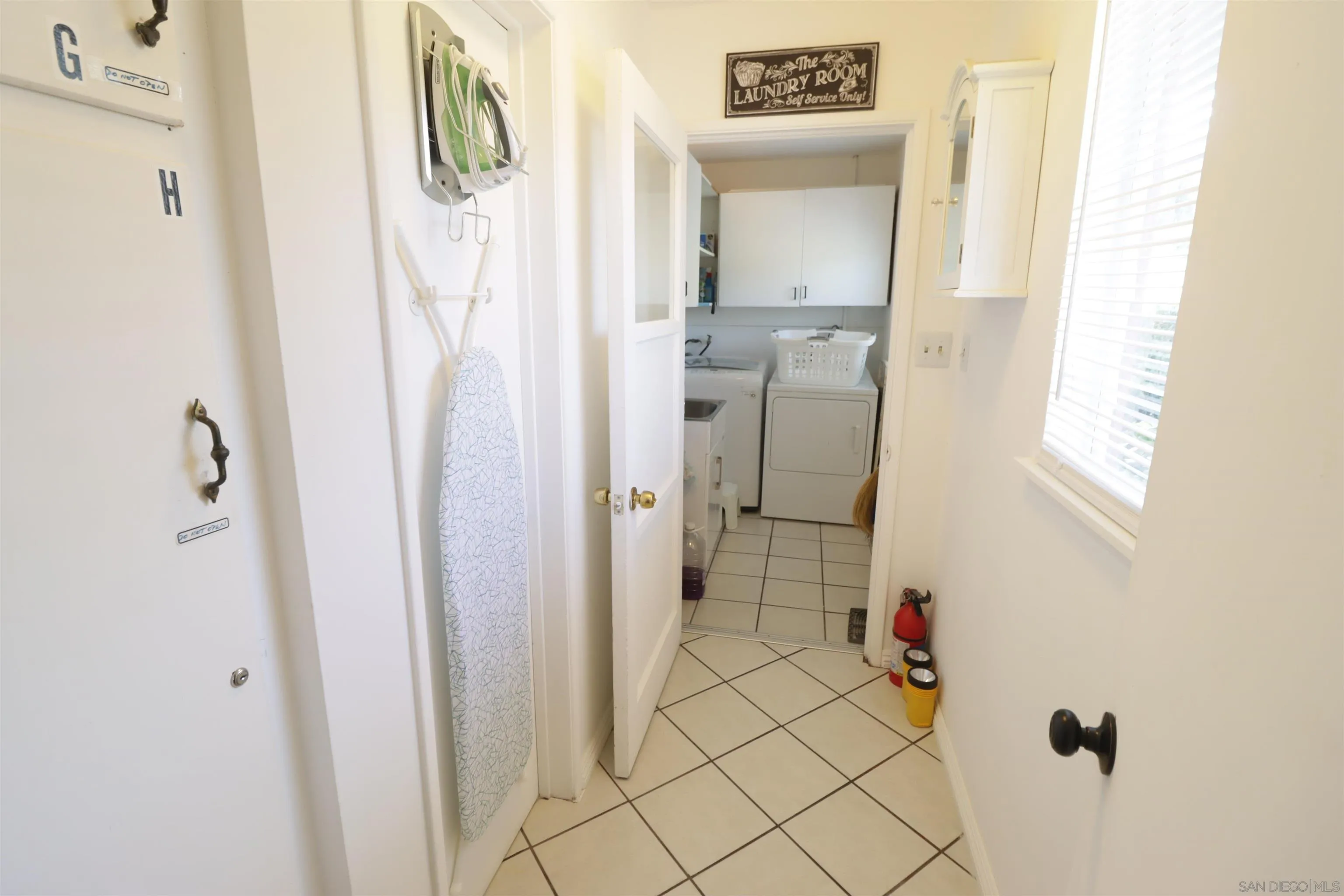 1233 Cresthill Road El Cajon, CA 92021 - Photo 32 of 50 a bathroom with a shower and a sink