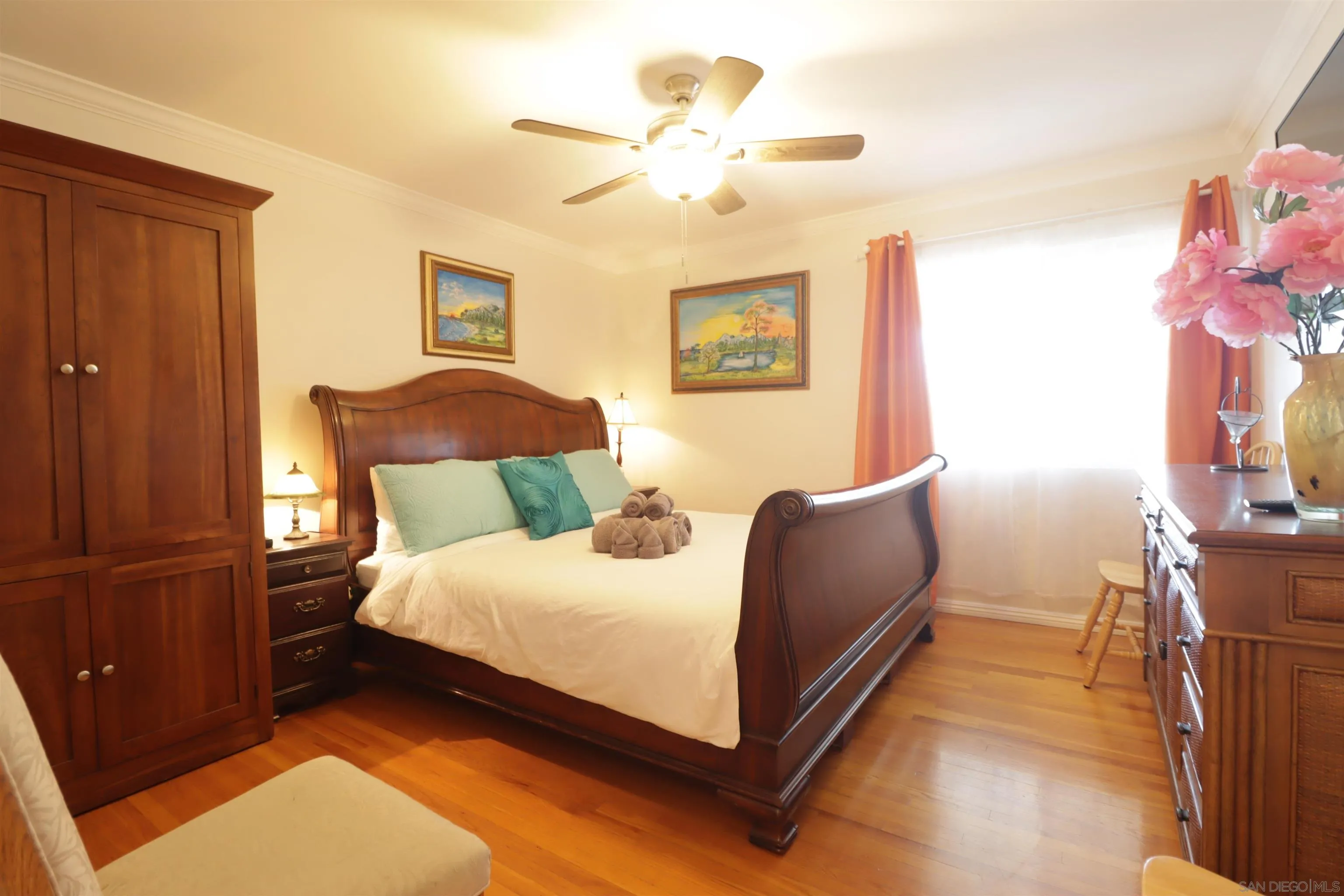 1233 Cresthill Road El Cajon, CA 92021 - Photo 34 of 50 a room with a bed and a chandelier