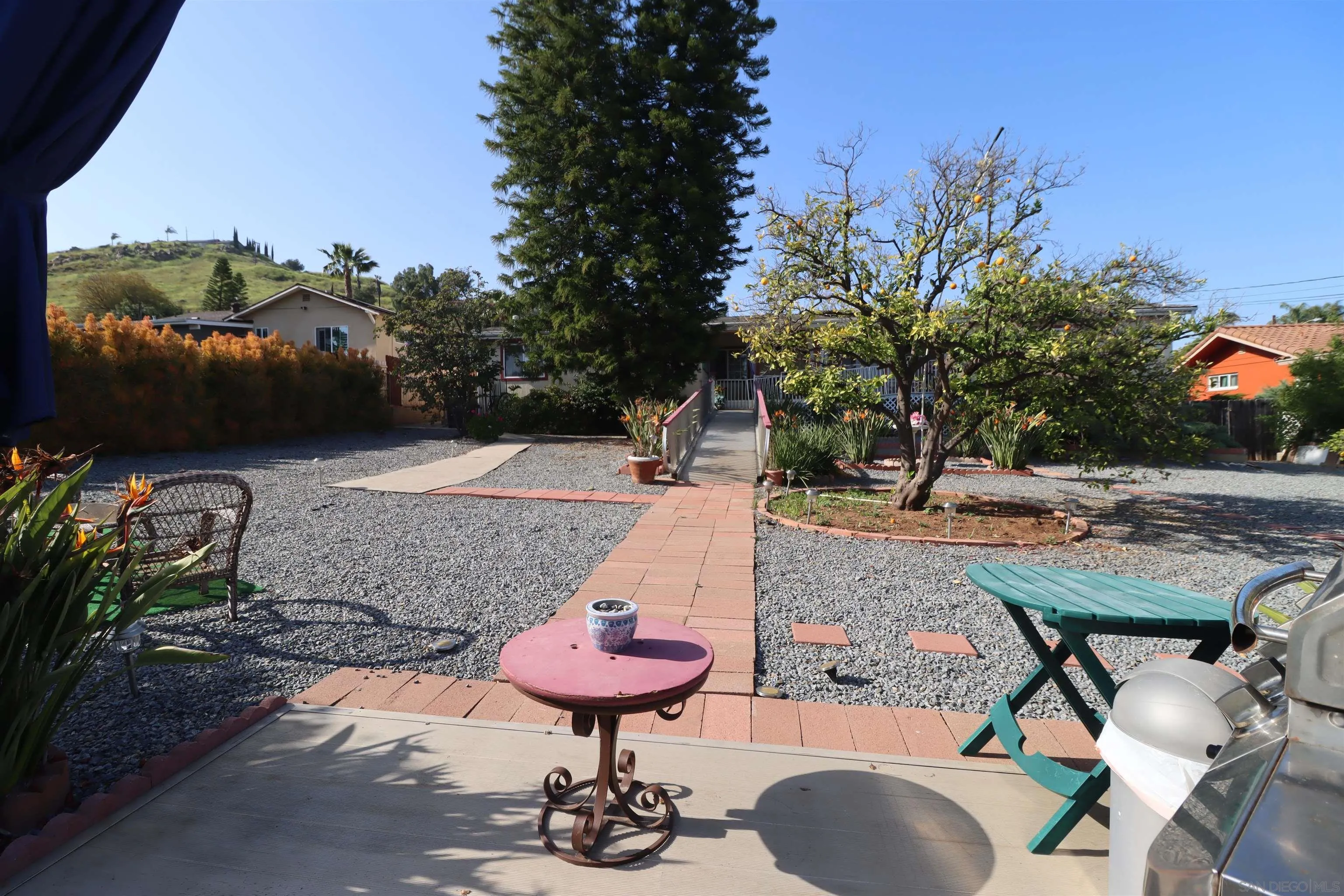 1233 Cresthill Road El Cajon, CA 92021 - Photo 44 of 50 a view of a backyard with plants and patio