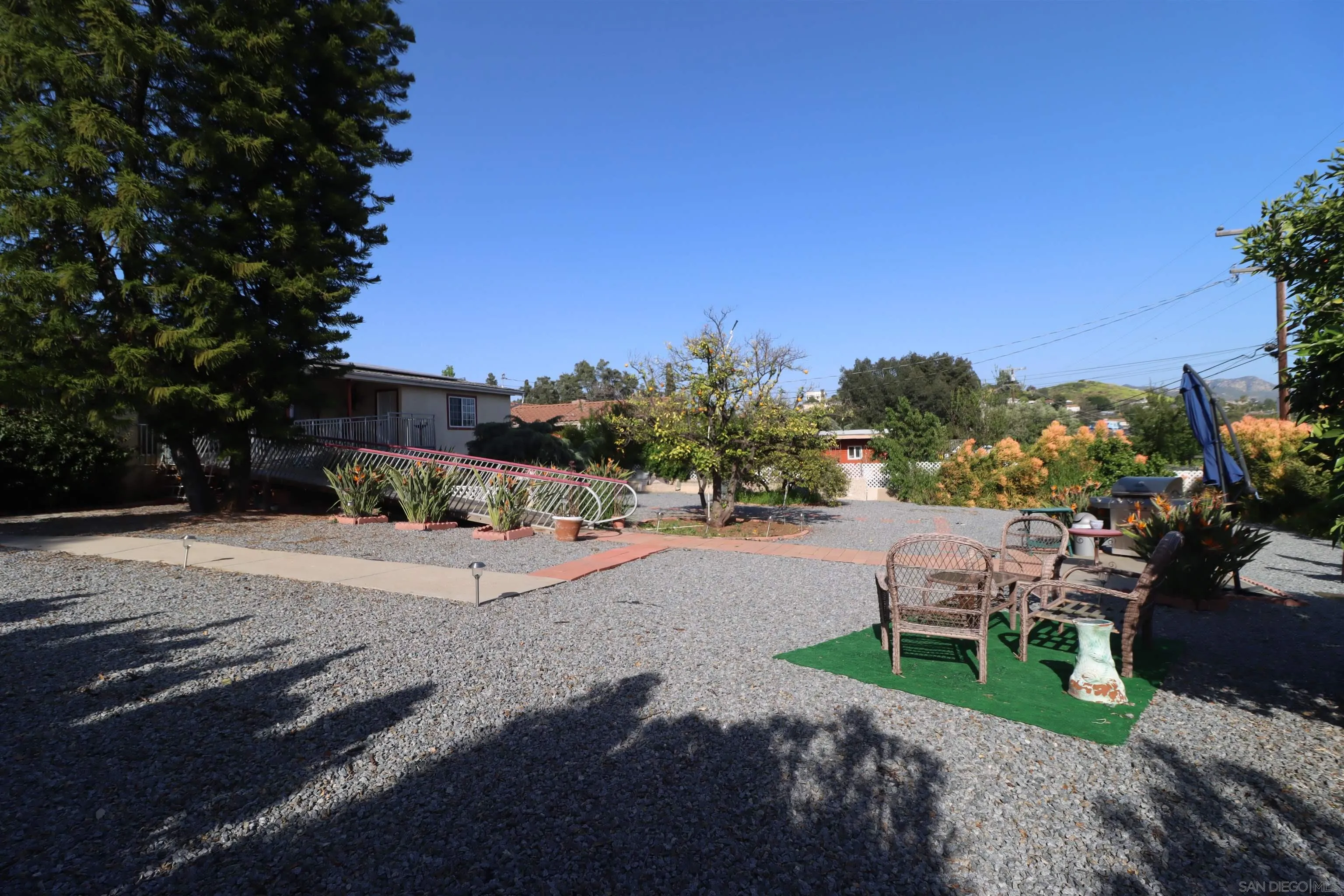 1233 Cresthill Road El Cajon, CA 92021 - Photo 46 of 50 a view of a backyard with sitting area