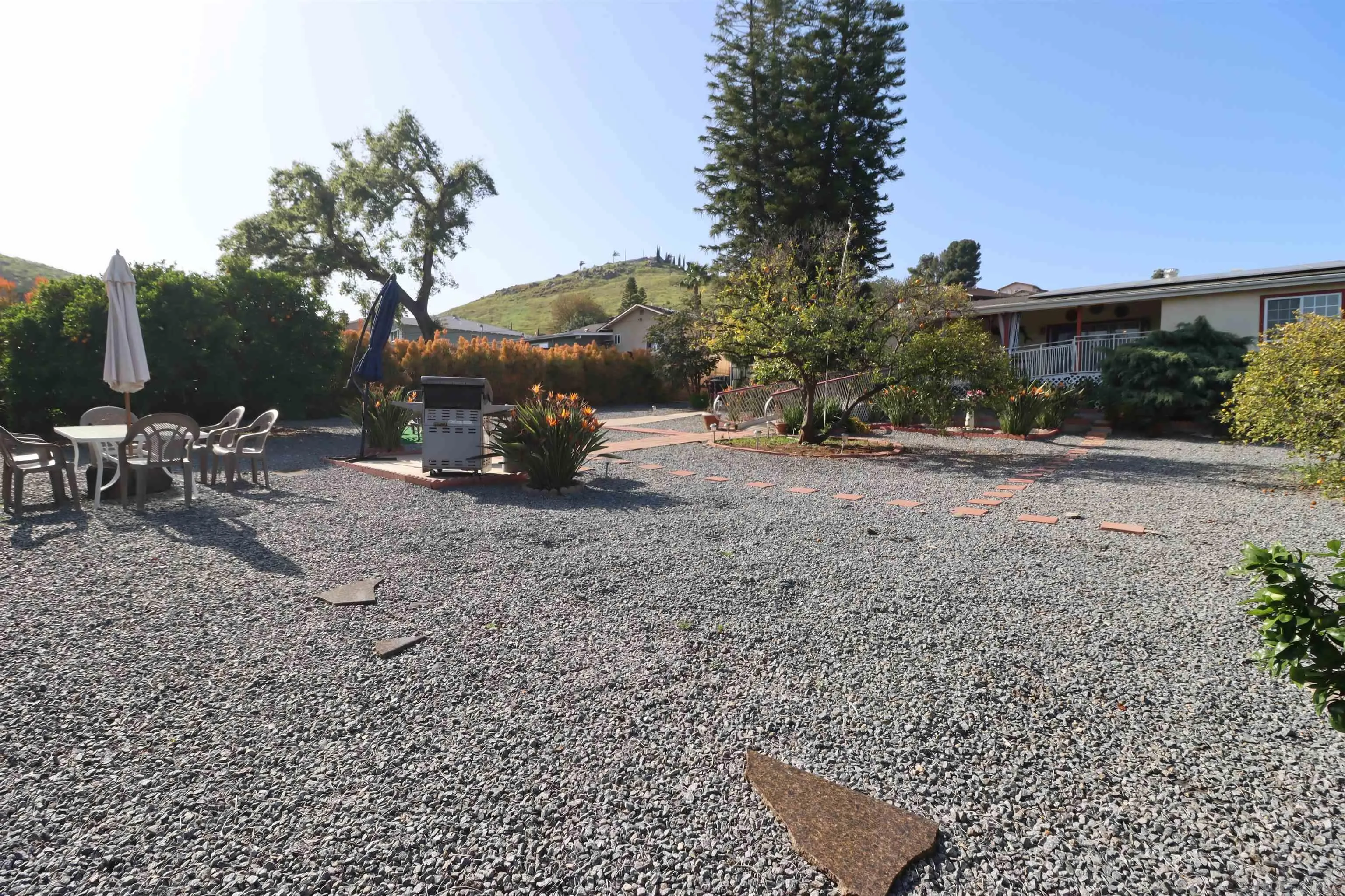 1233 Cresthill Road El Cajon, CA 92021 - Photo 47 of 50 a view of a backyard with sitting area