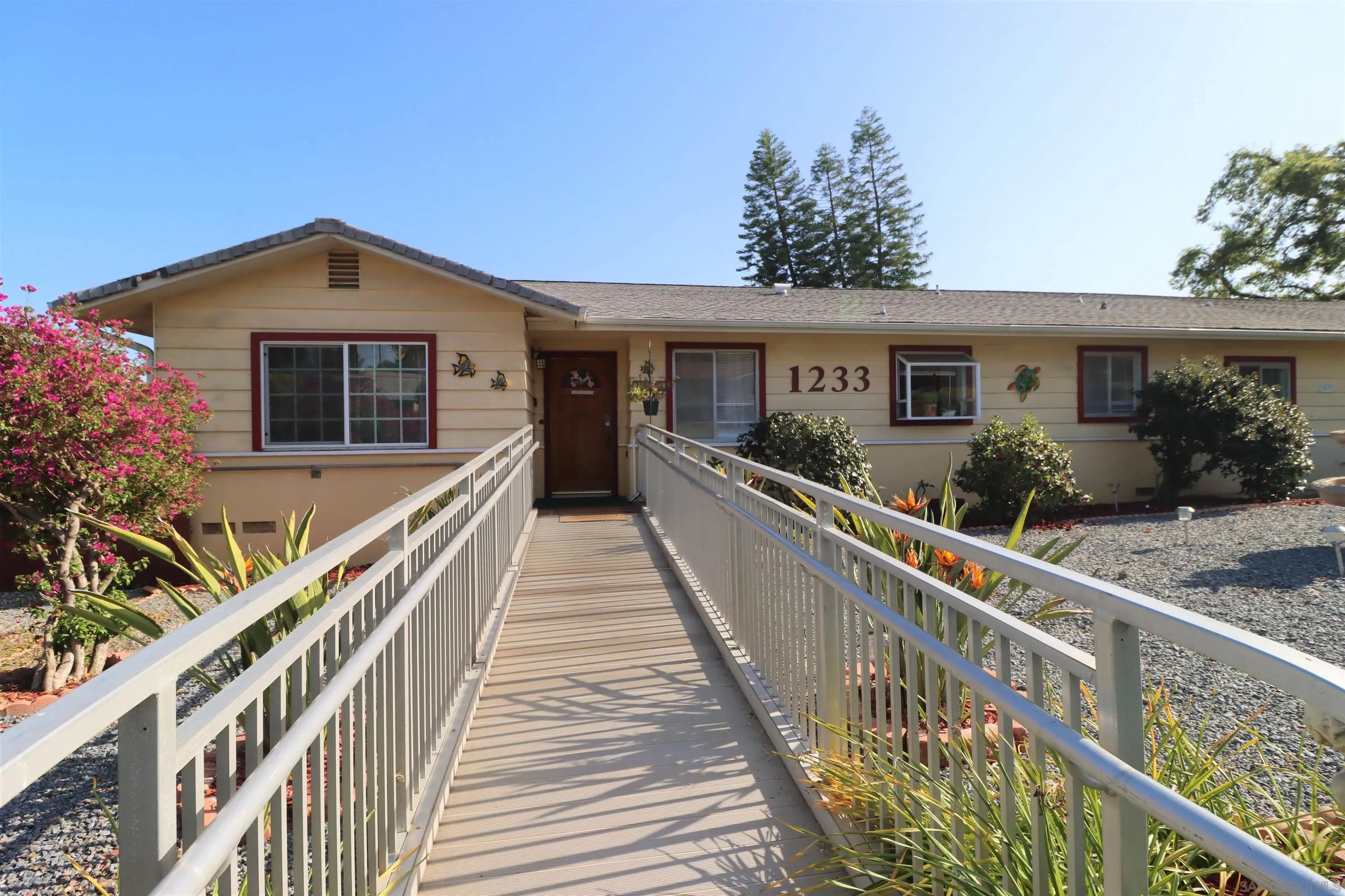 1233 Cresthill Road El Cajon, CA 92021 - Photo 5 of 50 a view of a house with wooden deck
