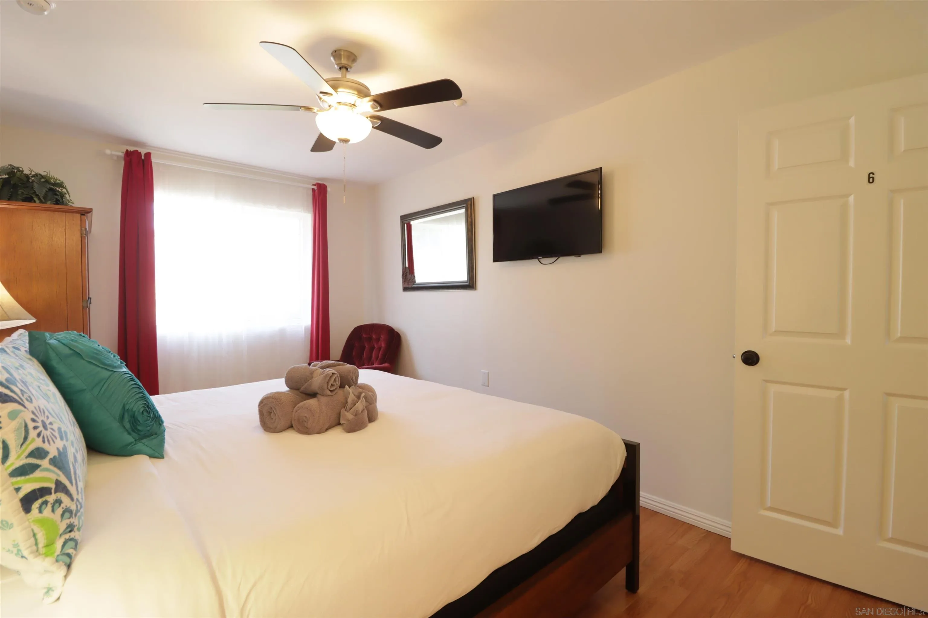 1233 Cresthill Road El Cajon, CA 92021 - Photo 8 of 50 a bedroom with a bed and a window