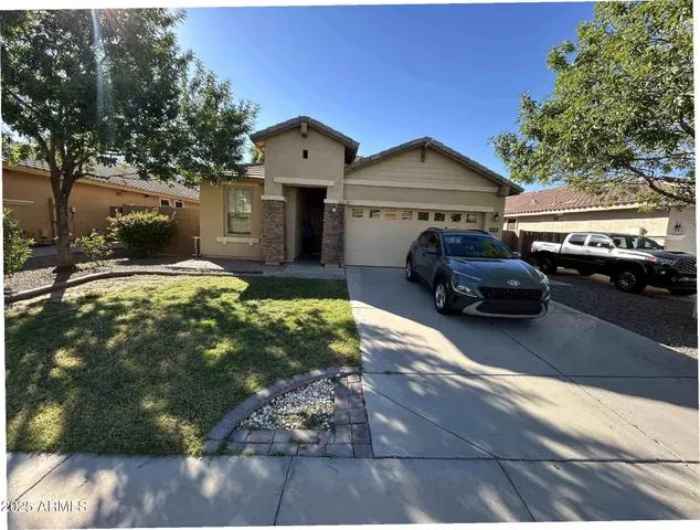 a car parked in front of a house