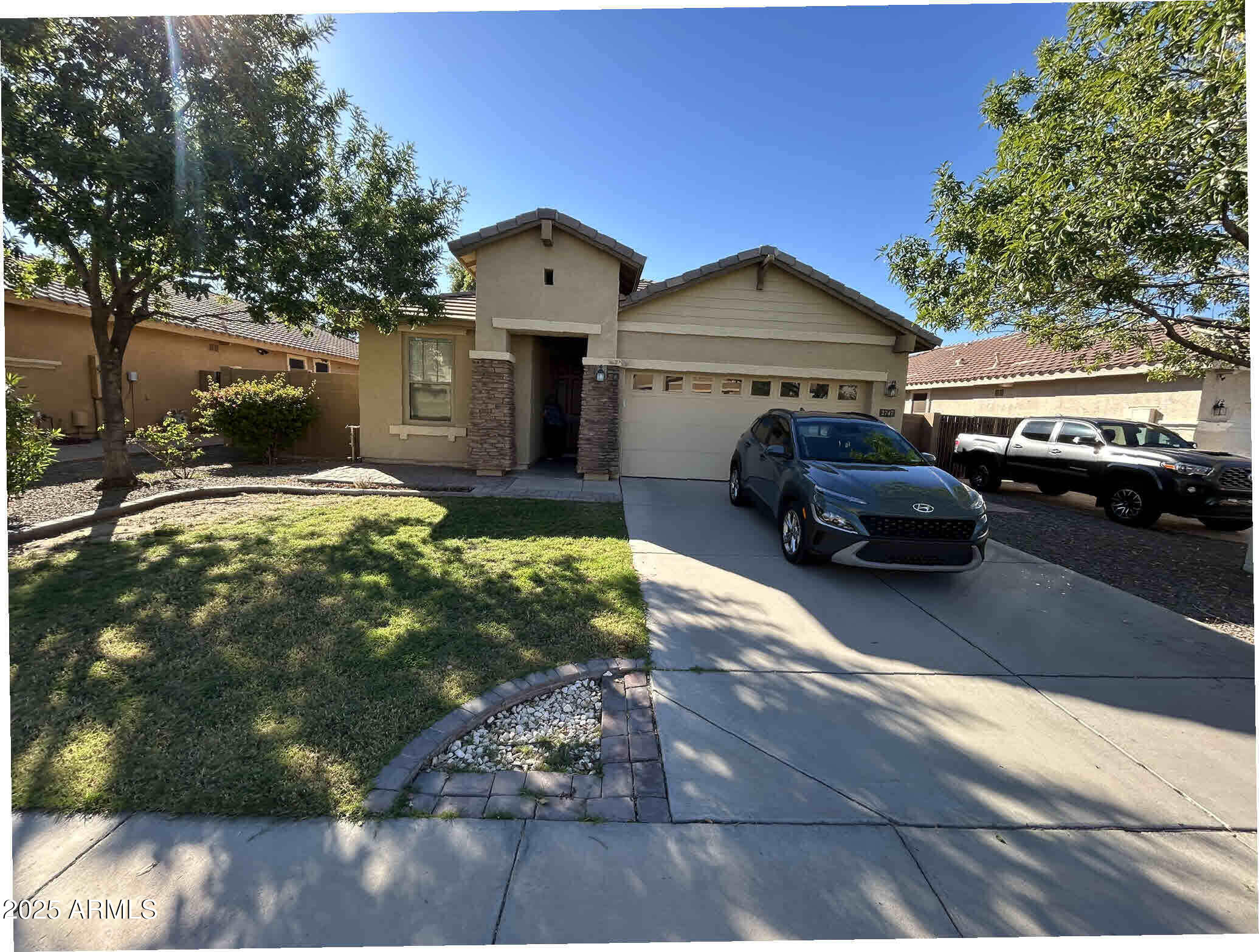 a car parked in front of a house