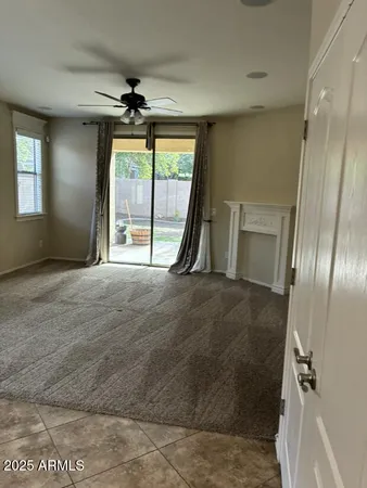 a kitchen with kitchen island granite countertop a sink dishwasher stove and cabinets with wooden floor