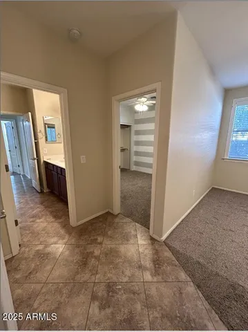 a view of livingroom with hardwood floor and a sink