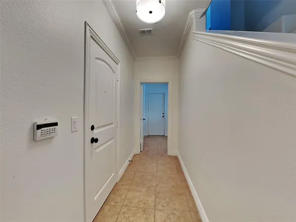 a view of a hallway with a white walls