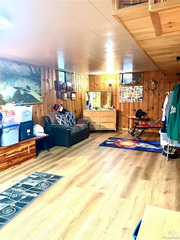 a living room with a table chairs and a couch